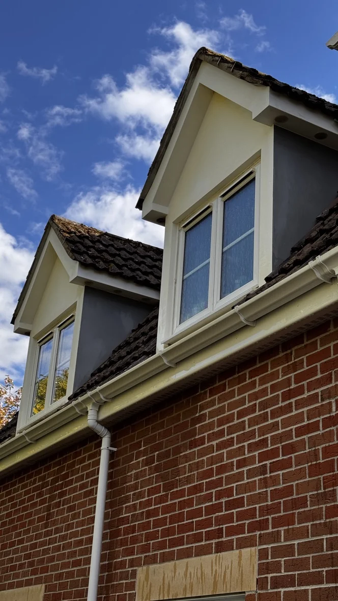 The same render after cleaning, bright and clean around the dormer windows, at a home in Chippenham