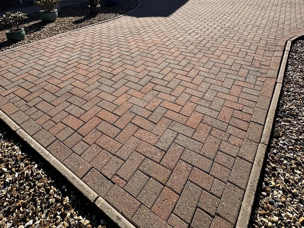 Herringbone block paving driveway after cleaning