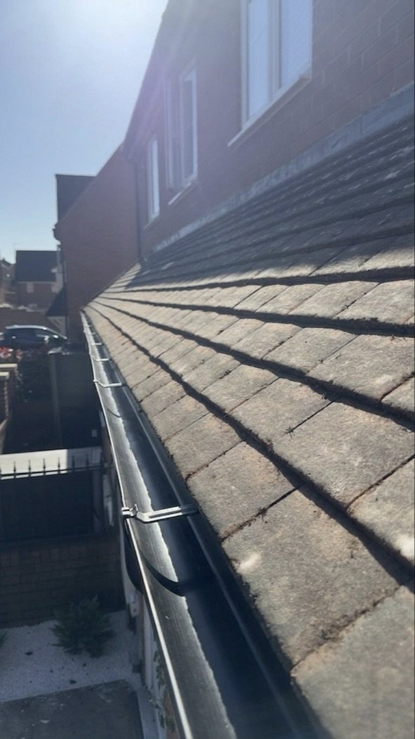 Gutter after clearance, moss and plant growth removed, Jetstream Powerwash Swindon