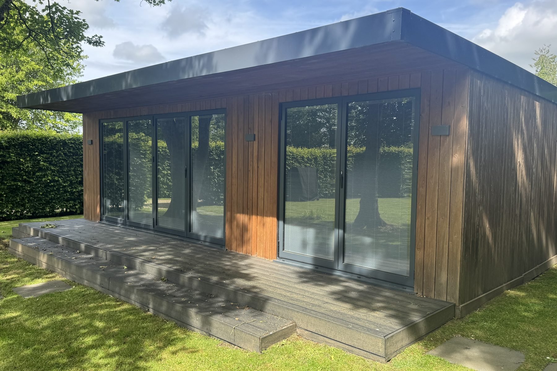 Timber garden room before exterior cleaning in Marlborough Wiltshire