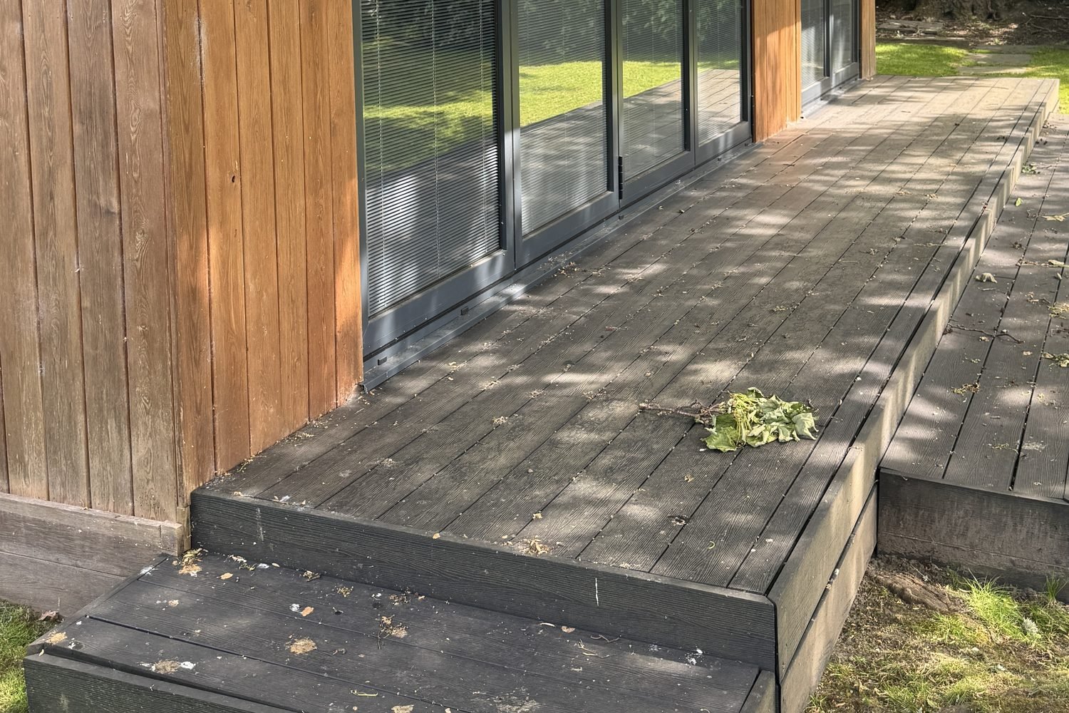Exterior timber cladding and decking before cleaning in Marlborough Wiltshire
