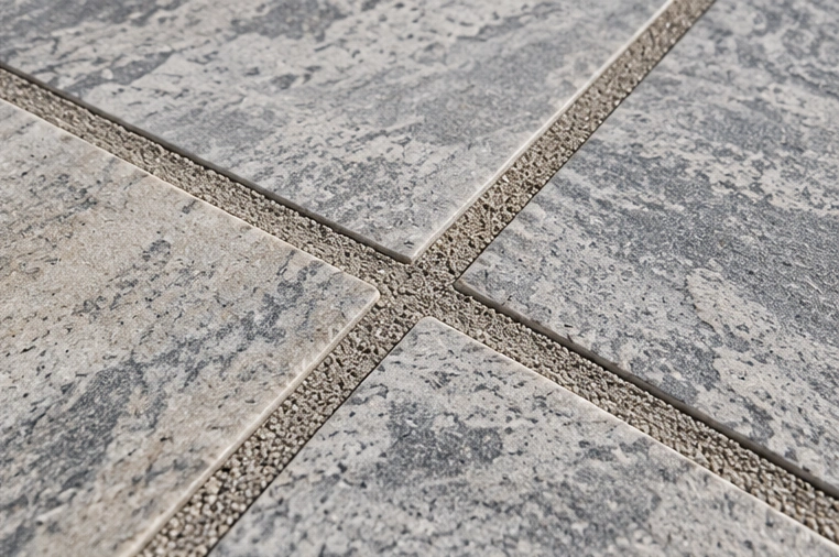 Mid-grey patio jointing with grey paving slabs