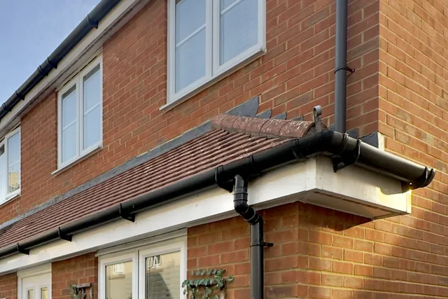 The same roof after cleaning, the tiles clean and their natural colour showing, in Royal Wootton Bassett